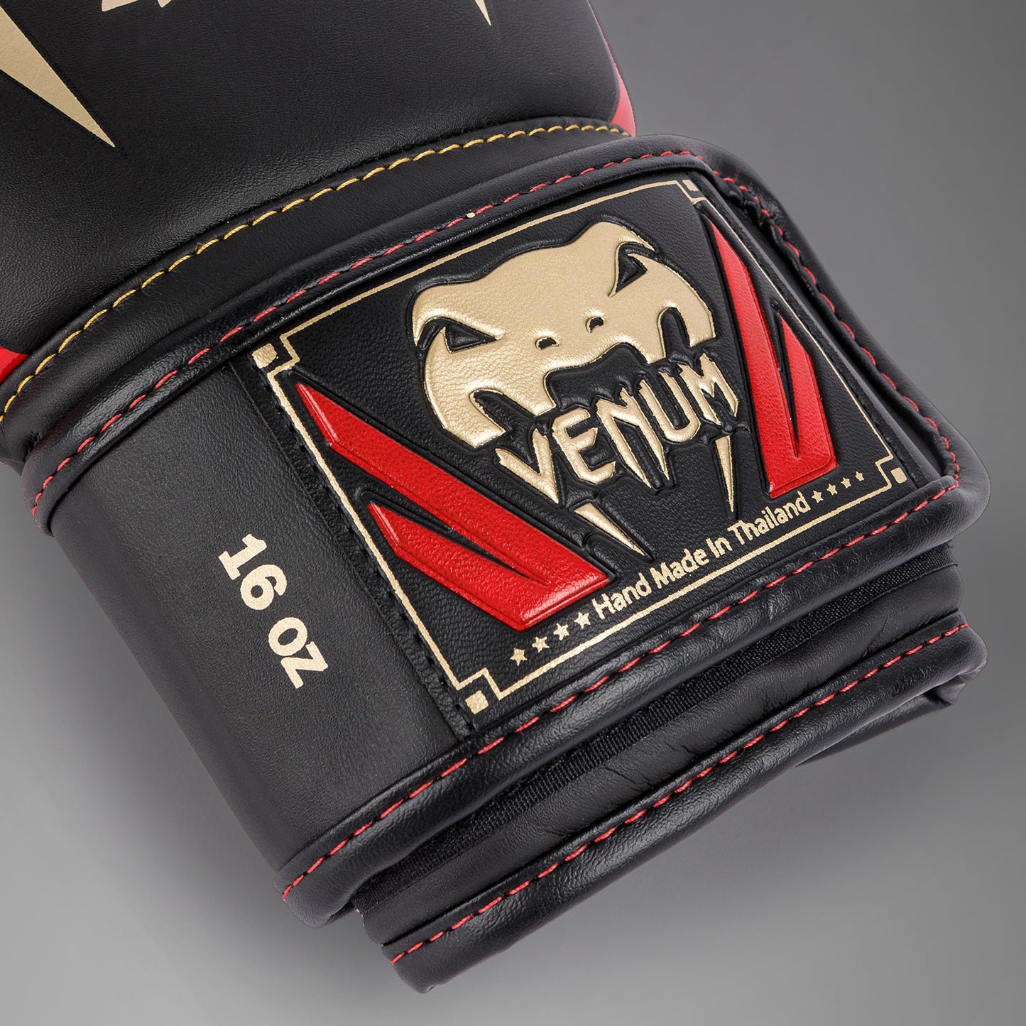 Gants de boxe Venum Elite - Noir/Or/Rouge