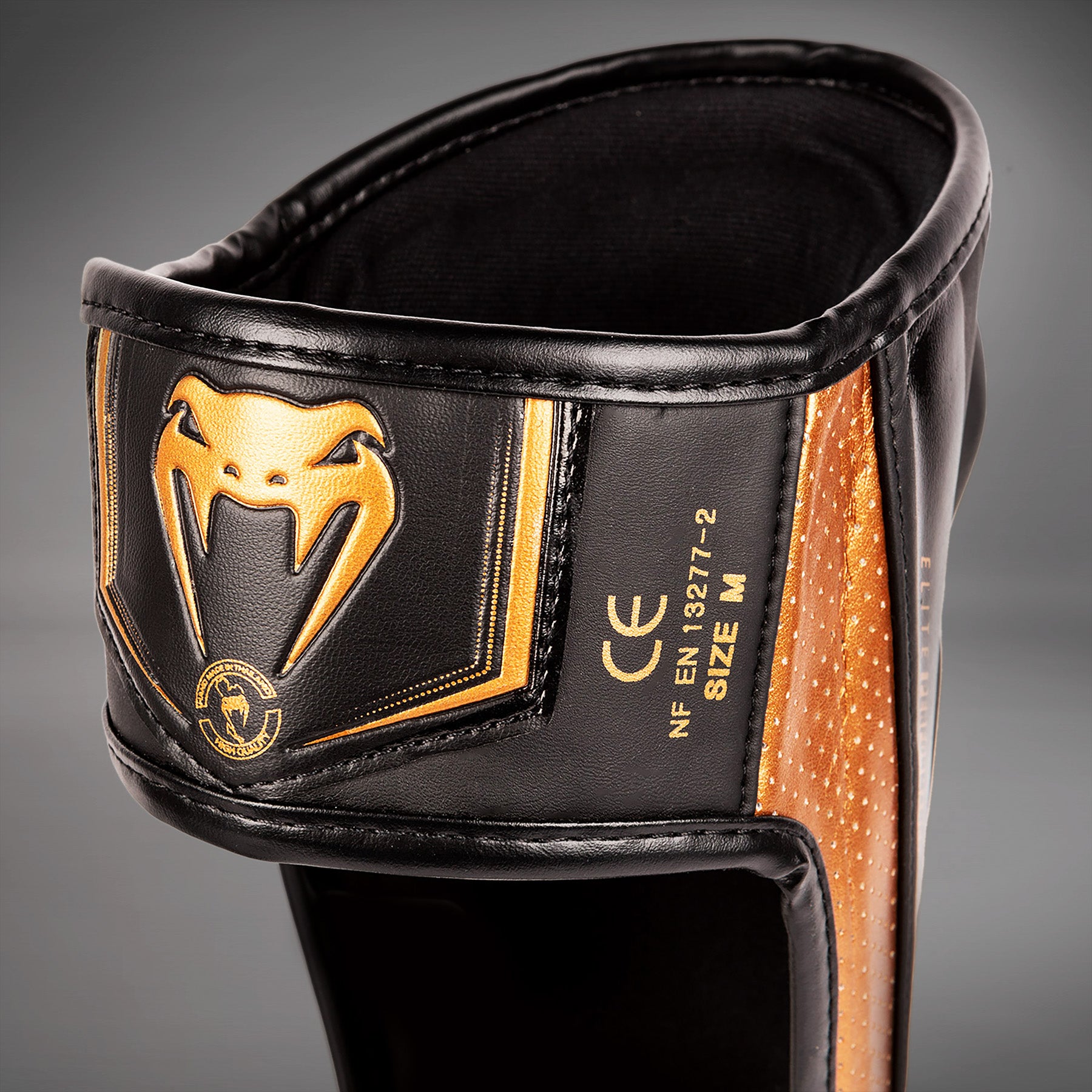 Protège-Tibias Venum Elite Evo - Noir/Bronze - product-type_Protège-tibias