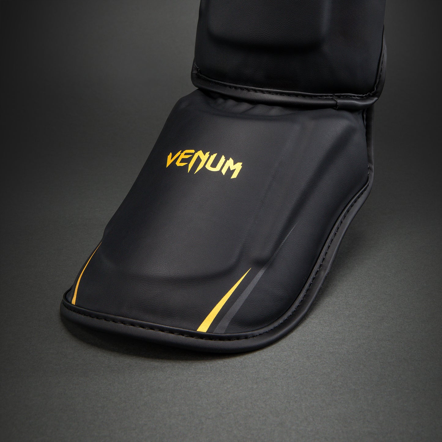Protège-tibias Venum G-Core - Noir/Or