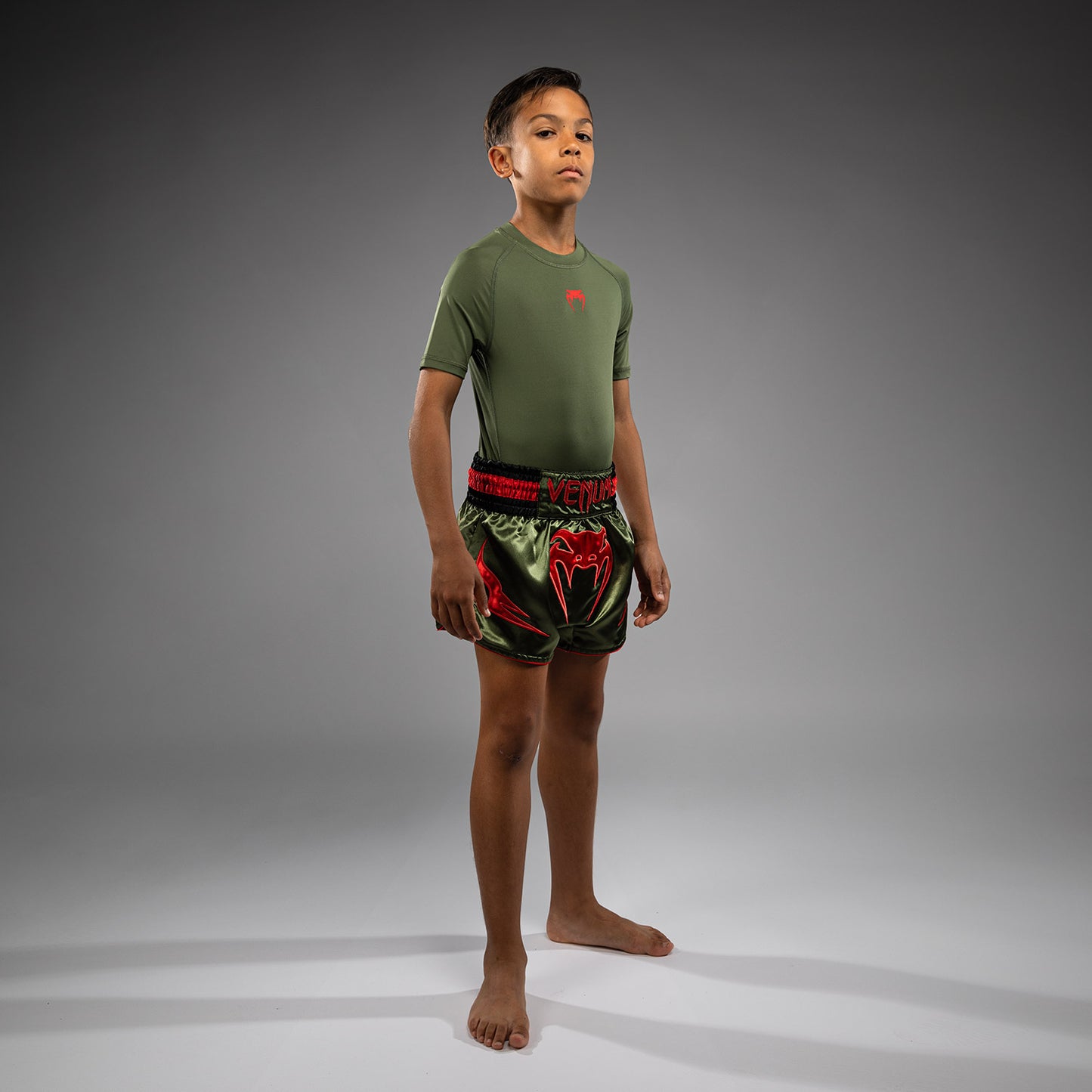 Short de Muay Thai pour Enfants Venum Inferno - Vert militaire/Orange - product-type_Shorts de Muay Thai